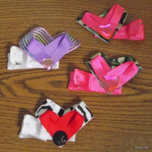 I like the different ribbon I used for these. Basically they are 2 ribbon hearts glued together and accented with an embellishment. Learn how to make the ribbon heart HERE.