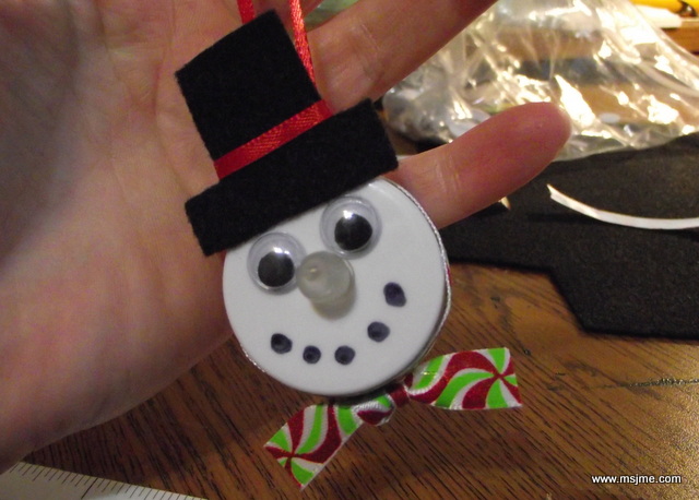 The hat is a piece of felt with a ribbon glued on. Googly eyes make everything better-who doesn't like googly eyes? and I used a Sharpie to make the mouth. 