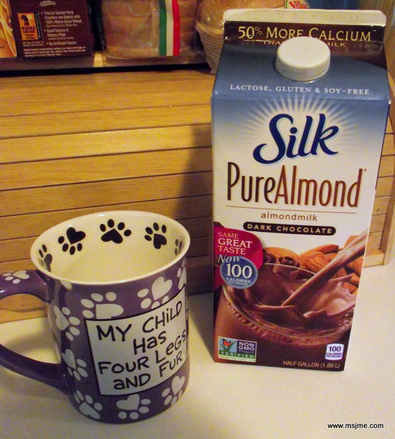It's cold here. Every winter is cold here.  My go to warm-me-up is hot chocolate.  No more mixes, standing over the stove for me.  The best hot chocolate is super simple and healthy! Warm up a cup of Dark Chocolate Almond Milk in the microwave for 1 minute. Stir. Cook for an additional minute, then enjoy! It is creamy, rich and good for you.  