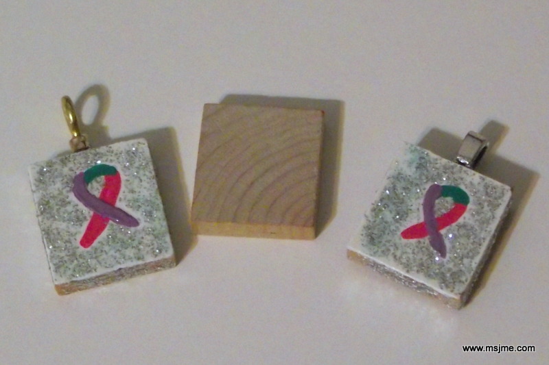 I hand-painted Thyroid Cancer ribbons onto Scrabble tiles for my friend and I.