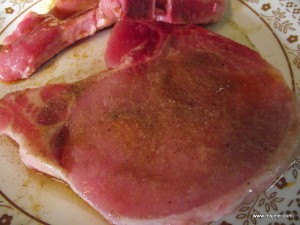 Cover each side of the pork chop with olive oil (about a teaspoon). Sprinkle a dash of Lawry's Seasoned Salt and TWO dashes of the Garlic Pepper. Then grill until meat is 165 degrees. Usually the hubby does 2 minutes on each side at first, then 3-4 minutes on each side at a lower heat. Times vary depending on how thick the chops are and how hot the grill is.
