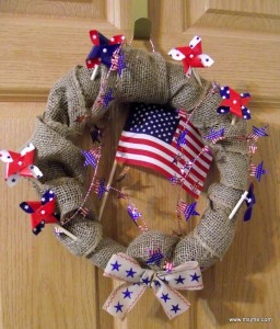 MsJme designed this wreath for a gift for family. Burlap adds extra texture and the pinwheels still move in a breeze!