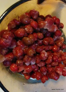 Place the cherries (still frozen) into a large saucepan and on medium heat.   