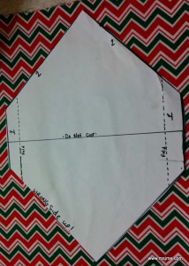 Lay out the pattern onto the fabric of your choice. I prefer patterned fabric because it helps hide my stitches (that are sometimes a little less than perfect).