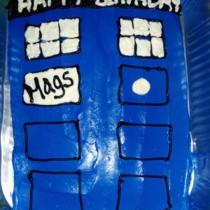 I finally had the opportunity to make a TARDIS cake and it turned out awesome! I used Wilton Gel Food Dye (mix of blue, red and violet) to get the TARDIS blue color. 