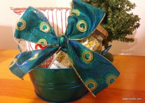 I "whipped" up this basket idea for Christmas 2015.  I found a small tin to put a jar of popcorn kernels and some popcorn boxes.  I re-packaged the kernels from a bulk buy and put it in a nice jar I prepared.  I placed a label on the jar with my favorite popcorn recipe and voila! all done.  