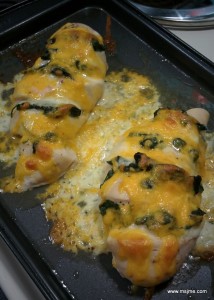Make sure to grease the baking sheet ! The cheese will melt and it will look messy. However, this also keeps the chicken moist and locks in lots of flavor. 
